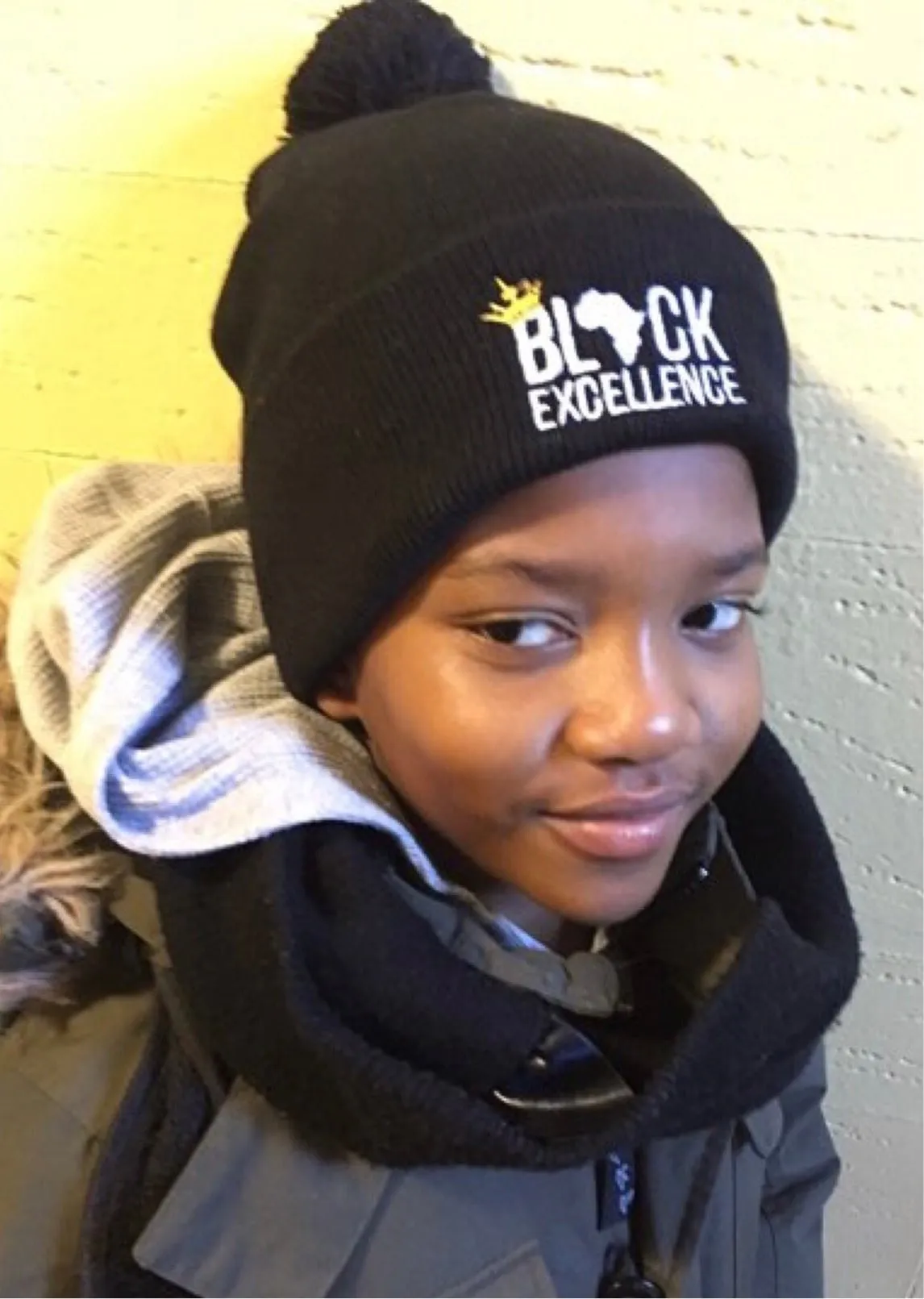 Black Excellence Pom Pom Knit Cap